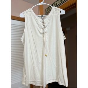 Daisy Fuentes: White/cream colored sleeveless top. Very soft